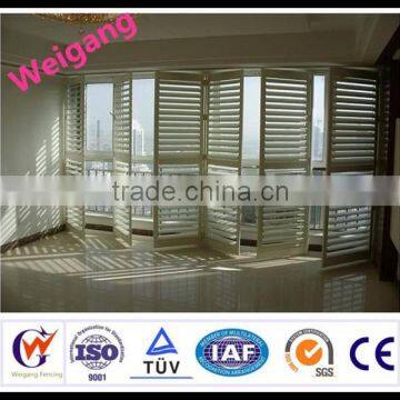 Interior steel shutter with powder coated designs