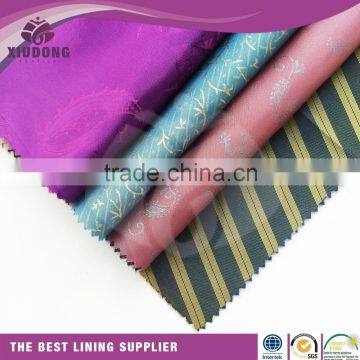 China ShaoXing XiuDong Fabric Factory TR fabric material for making dresses to indonesia market