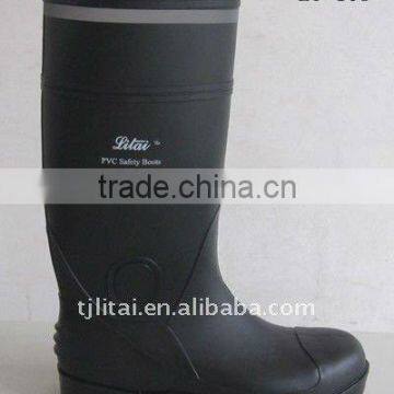 Black safety boots with reflective strip