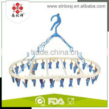 Cheaper Plastic clothes peg hanger Plastic Folding Clothes Dryer