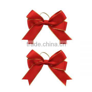 Manufacture making ribbon bows with elastic for wine bottle