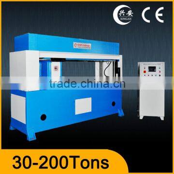 new travelling head hydraulic garments fabric cutting machine price