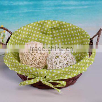 Bamboo basket with handles and floral cloth liner for sundries cheap