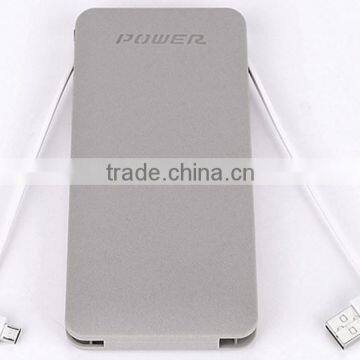 Dual USB 10000mah abs mobile power bank with built-in cable