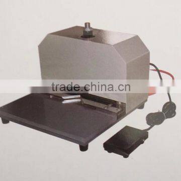 Pneumatic leather corner cutting machine for photo frame