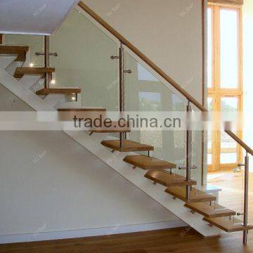 Indoor wood step straight staircase with glass railing