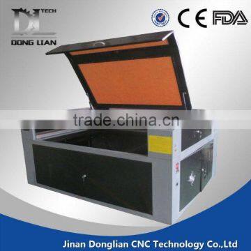 jinan Donglian 6090 glass cup laser engraving machine wood furniture keyboard