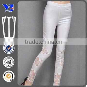 white cut out legging with lace embellishment