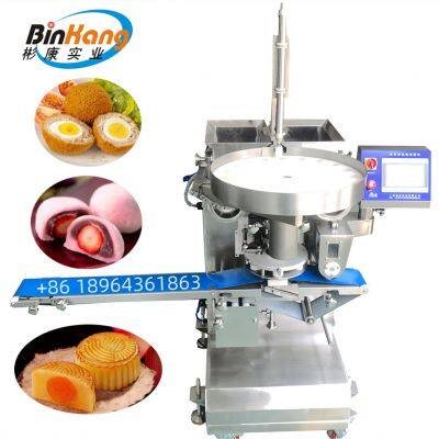 Solid filling encrusting machine/multi-functional encrusting machine/egg yolk mooncake making machine