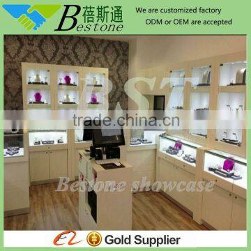 Refferenced jewelry store showcase picture wall mounted showcase designs