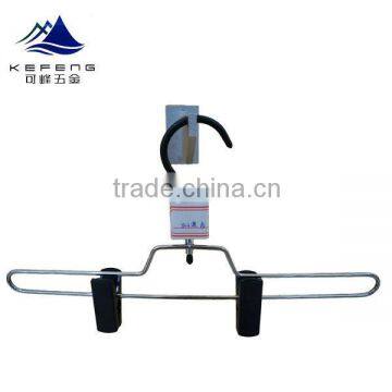 Metal pants hanger with plastic clip