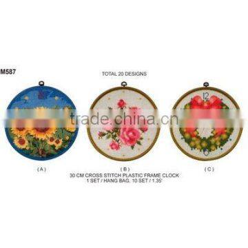 M587 CROSS STITCH PLASTIC FRAME CLOCK