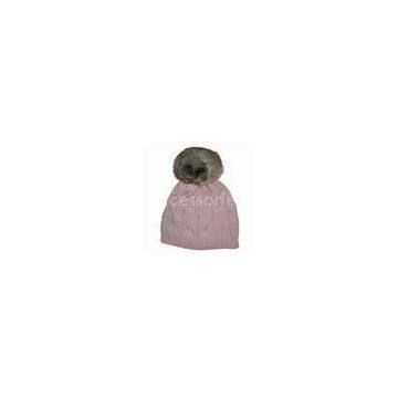 Knitted winter hat in special large cable design, made of soft acrylic, suitable for young ladies