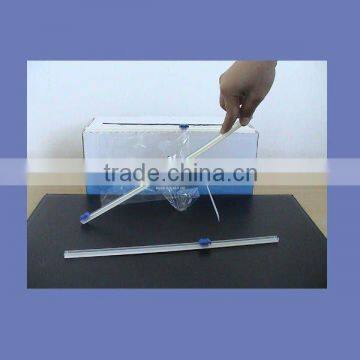 Innovative stick-on type cling film slide cutter