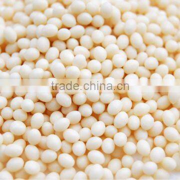 Coated hot melt adhesive