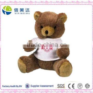 plush sitting bear with white shirt