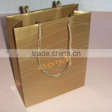 luxury gold color handle shopping paper bag with high quality