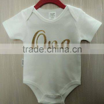 Gold glitter on Baby romper budysuit. print your design with 12 diffreng glitter color. No minimum. Drop sipping