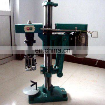 Semi - automatic glass bottle screw sealing machine