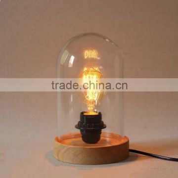 Decorative industrial cloche table lamp with Edison filament bulbs