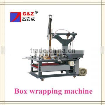 Gift box wrapping machine