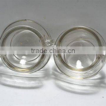 empty clear glass candle jar with round body