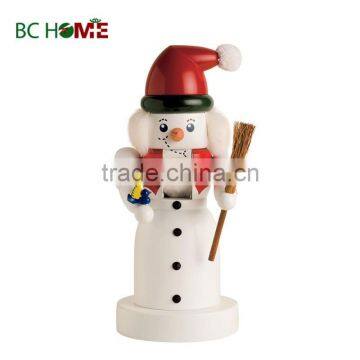 exquisitely crafted snow man wooden Nutcracker with bird