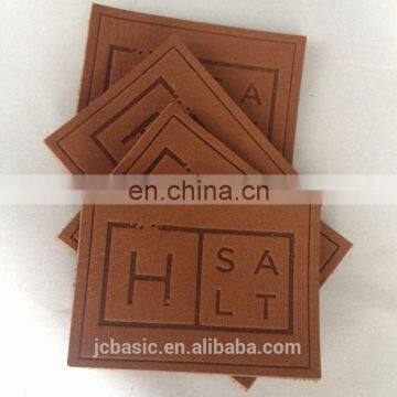 custom logo embossed pu leather patches leather clothing label