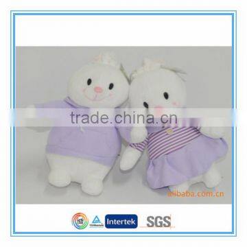 Stuffed and plush toy rabbit with dress