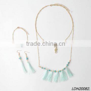 Double pendant hippocampi and turquoise with tassel necklace with matching earrings and bracelet