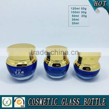 Bule Colored Glass Cosmetic Serum Bottle and Glass Cosmetic Cream Jar With Gold Pump Lid photo-4