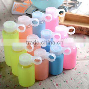 Alibaba different color beautiful glass water bottle with silicone sleeve for sale