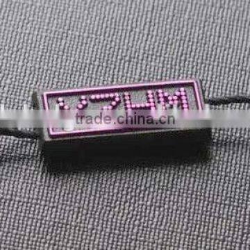 purple string plastic seal tags