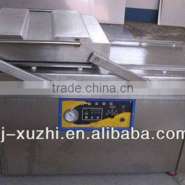 Dual chamber vacuum packing machine