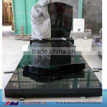 Black granite tombstone and monument