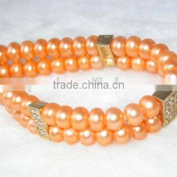 Price 7-8 mm Button Shape Pink Freshwater Pearl Bracelet photo-2