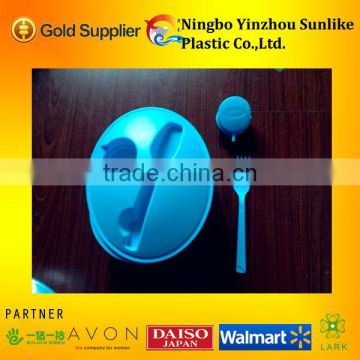 plastic round salad bowl with fork