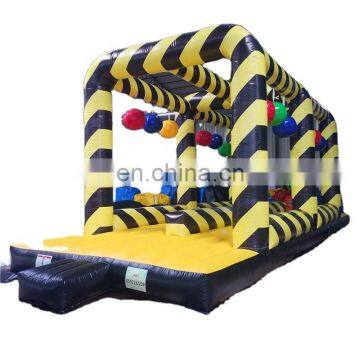 Children outdoor pop up inflatable balance wipeout game with wrecking ball obstacle