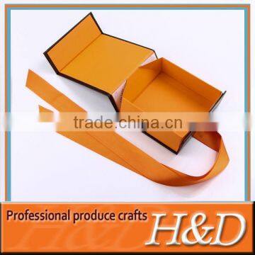 Orange paper candy box with silk ribbon