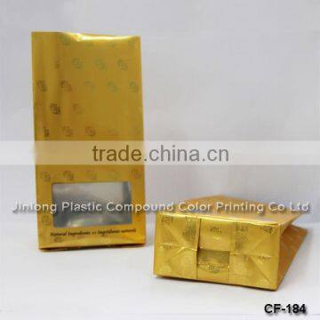 block bottom bag with demetalized material