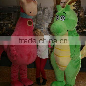 dino Flinstones and green dragon mascot costumes on show