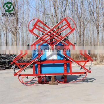 Farm tractor use boom sprayer pesticide sprayer