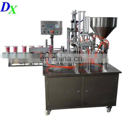 Automatic Mul-tifunction Oil Milk Yogurt Jam Jelly Servo Rotary k Cup Filling Sealing Machine