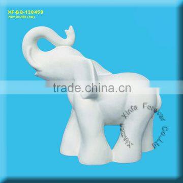 unpainted ceramic elephant figurine