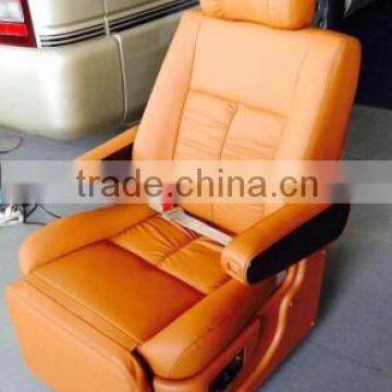 Healthcare chair with continuity recliner and adjuste armrest
