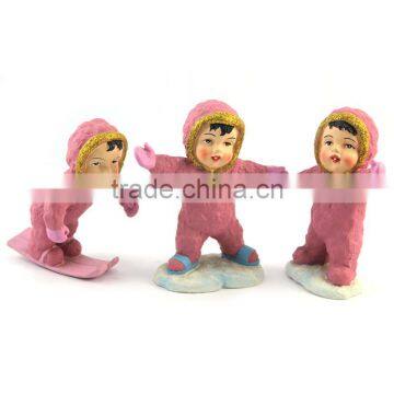 2015 Funky Children In pink Coat Skiing Figurine