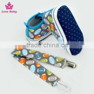 Fashion Rugby Pattern High Quality Newborn Crib Shoes Baby Shoes Matching Pacifier Clip photo-4