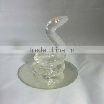 crystal snake figurine with mirror bottom