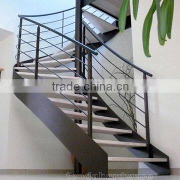 steel structure double spine wood curved stairs in black with rod railings