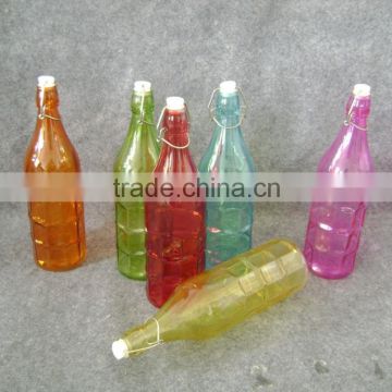 colorful glass water bottle with plastic cork